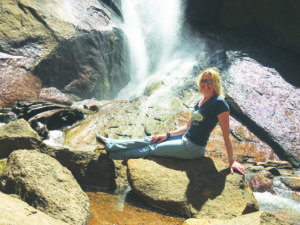Woman at waterfall