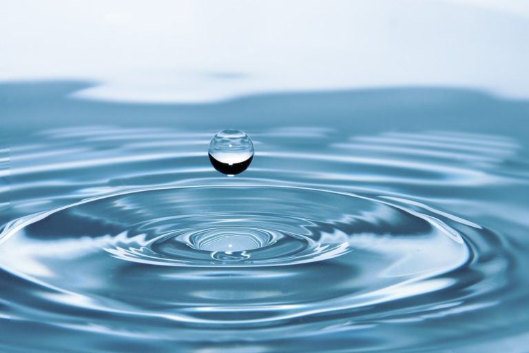 drop of water creating a ripple