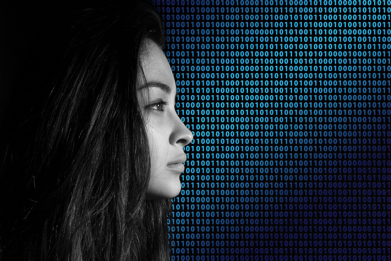 woman in front of digital data