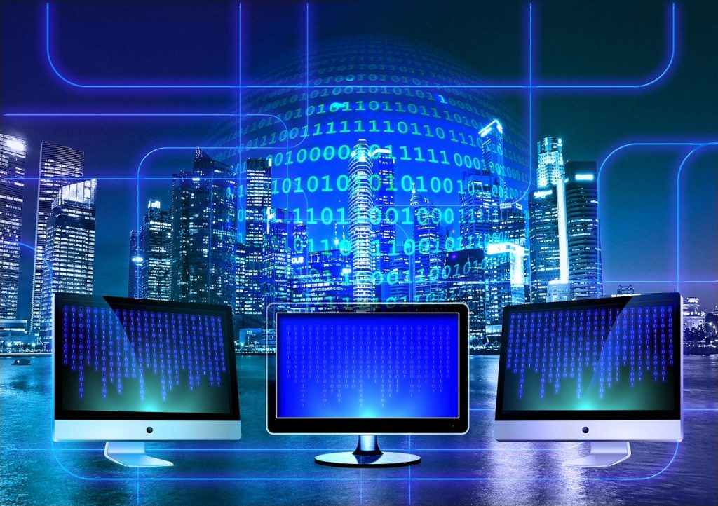computer monitors with blue binary