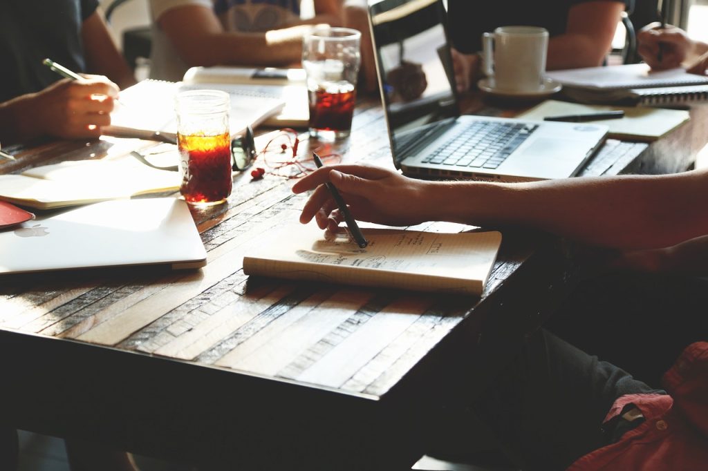 Startup business people working at a table with laptops