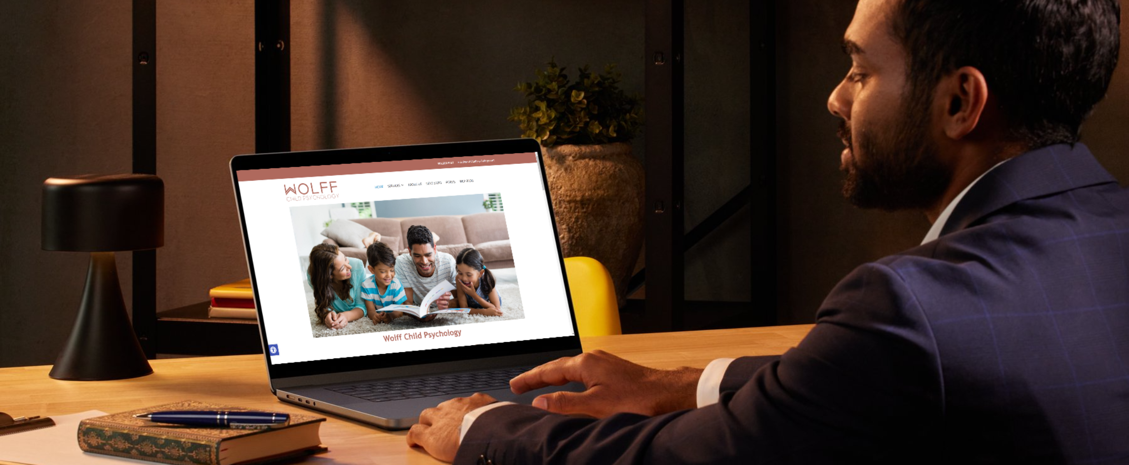 Man sitting at a desk looking at a medical website that is HIPAA compliant