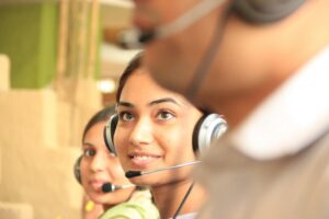 A generic stock photo of a call center woman.