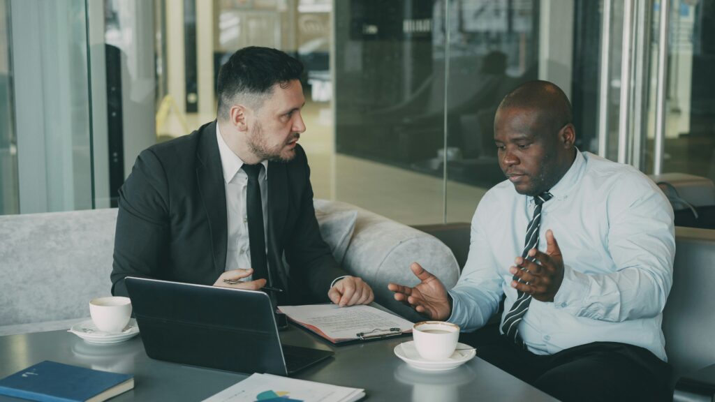 A marketer and a client have a tense conversation.