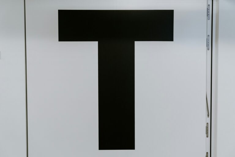 The letter "T" in black on a white background, representing Trustworthiness in Google's EEAT framework.